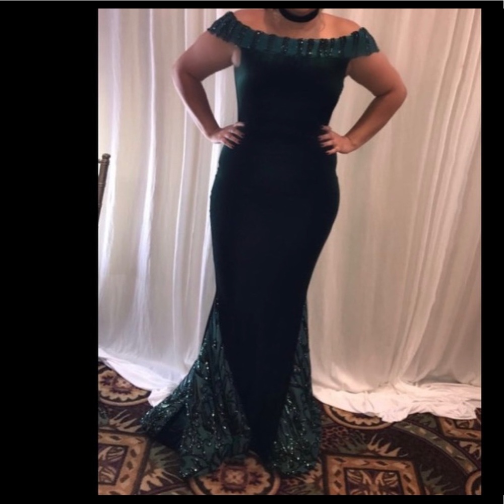Emerald green off the shoulder dress.